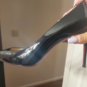 Christian Louboutin...Size 40.5...Black Patent